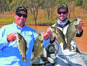 The author and Joshua Higgs caught these bass on plastics fished vertically.