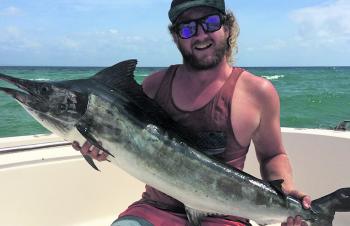 Owen Howe with his first marlin caught at Rooneys on a stickbait.