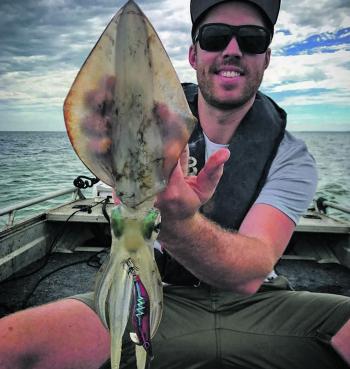 Squid guru Cam Chapman with a solid squid caught on the Yamashita Live Search Jigs.
