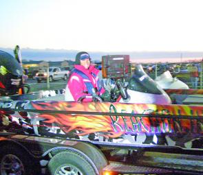 Kim's 21' Legend Alpha 211, 250hp Evinrude and fire breathing Reaction Innovations wrap are one of 51 boats launched in quick succession in the pre-dawn light before daily blast off. 
