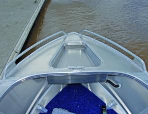 A drained anchor well plus bow rails are handy features in a budget priced rig. 