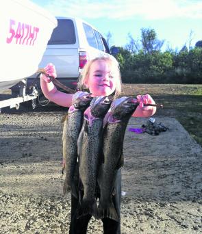 Two and a half year old Bronte is as proud as punch with these great browns taken trolling at Lake Repulse.