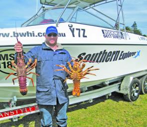 Port Fairy based diver Daniel Hoey and some Portland crayfish.