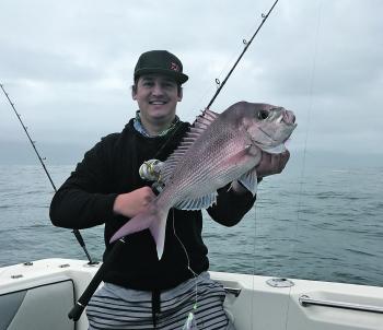 Justin with a rare snapper. Some say it was definitely bought from a fish shop.
