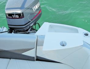 The craft’s transom-mounted livewell was equipped with a decent cover and latch to prevent water spilling. 