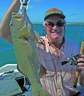 Michael with a tasty coral trout caught at Cumberland Straight.