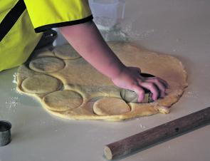 Once the dough has been mixed and proved, use a 12cm cookie cutter followed by a 4cm cutter for the hole.