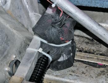 Although not a requirement, covering the bilge pump with fly screen to stop debris getting into the pump is a brilliant plan. Braided line and fine monofilament offcuts are a particular problem and can wrap around the pump impellor, eventually seizing it 