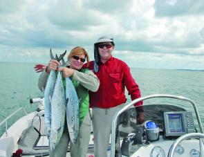 The author and wife, Denise, with a feed of mackerel taken in the Rainbow Channel last November. 
