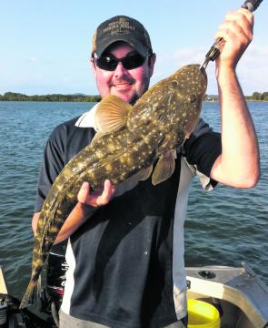 The author with a typical November-style flathead. You can catch them trolling, lure casting and baitfishing.