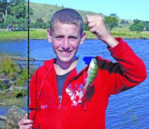 Adam, aged 12, with a monster redfin!