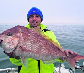 Glen Palmer displays his solid 6kg snapper from the Western Entrance.