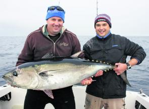 The boys with a 40kg-plus southern bluefin tuna, one of many caught in a hectic three-hour session.