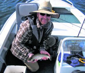 Canadian Steve McCormack with his first fish on Australian soil, a Eucumbene brown. 