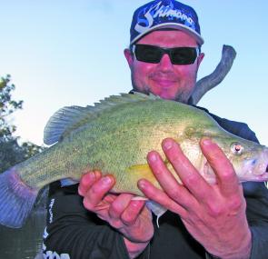 Gareth Lynch with a typical spring yellowbelly caught on a cast lipless crankbait.