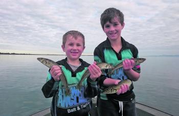 The author’s young blokes holding up a few of their first ever winter whiting. We had a great day catching 47 whiting. Not bad for the end of July!