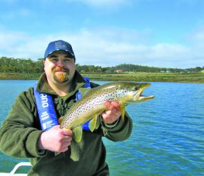 Darrell Wells with cracking Great Lake brown trout.