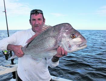 Ross with a snapper he caught and released at Caloundra.