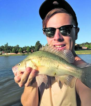 Kaleb Oxley with a Kialla Lakes yellowbelly. 