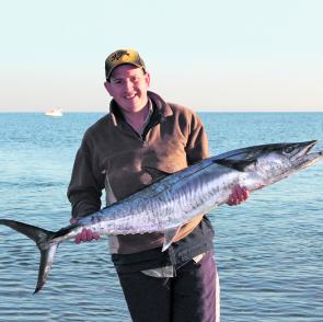 The author with a typical size inshore Spanish mackerel. The long and skinny profile of this fish gives away the fact it is a male fish. The females are usually much more robust. 