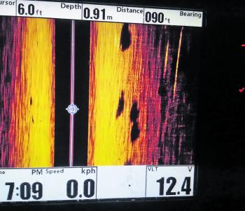 Side imaging sounders like this Humminbird 1198 are valuable when it comes to locating fish. There’s no mistaking when barra are cruising past the boat.