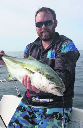 Ben Barnes with an 80cm kingfish caught on a 150g knife jig.
