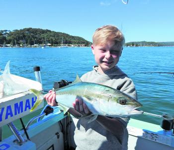 This young man travelled from Helsinki to catch a kingfish with his dad – the smile says it all. 
