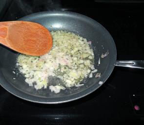 Melt the butter in a frying pan over medium heat. Add the finely chopped shallot and cook and stir until tender. 