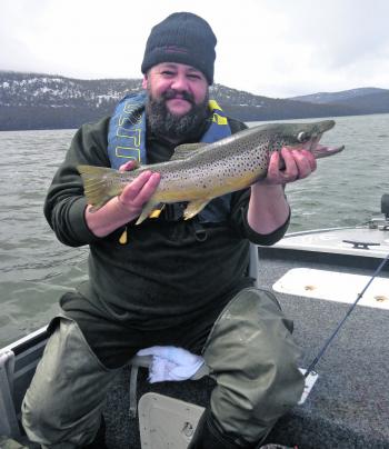 John Peck with an awesome winter trout from Woods Lake.