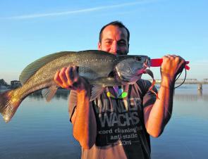 Andrew with his first mulloway, caught on a 6” Berkley Jigging Grub. This fish was tagged and released.