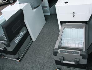There are two big Waeco fridge/freezers under the seats, powered with the help of solar panels on the roof.