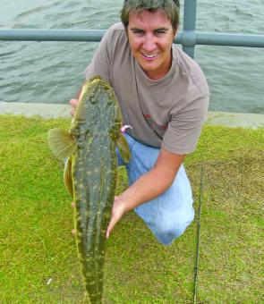 Andrew fought the bad weather and caught this flathead along the canals.