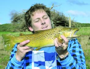 This average sized trout for the Aire/Ford River system fell to a Rapala lure fished close to the bank.