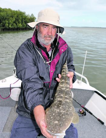 Fishermans Corner regular Paul Mares with a quality lizard taken from one of the creek mouths on the western side of Fraser on a recent trip with the author.