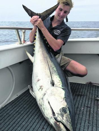 Lewis Holland with a 60kg Southern bluefin caught while targeting broadbill.