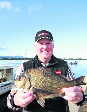 Greg Rooke with the fish that earned him the Big Bream prize. 